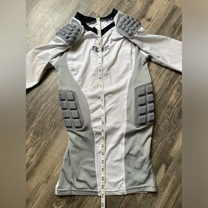 Schutt padded football shirt.  Youth size medium.